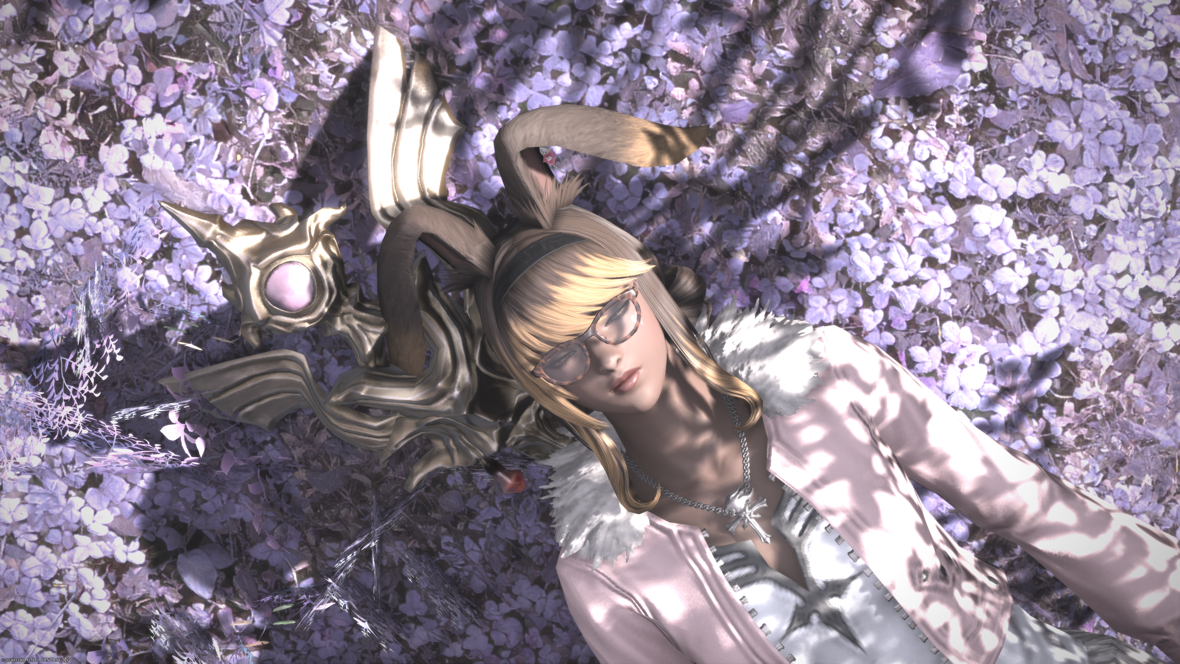 Adrianna sleeping in a field of flowers